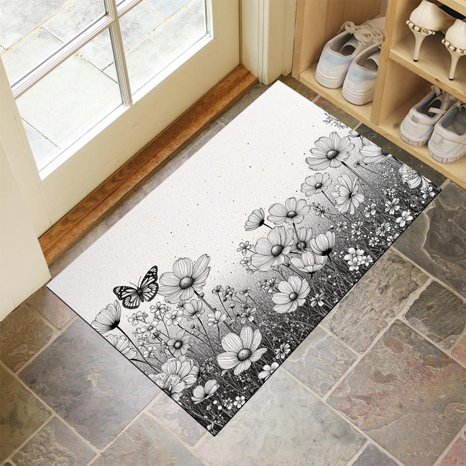 Tapis d'entrée antidérapant gris pour stopper la saleté et sécuriser le sol
