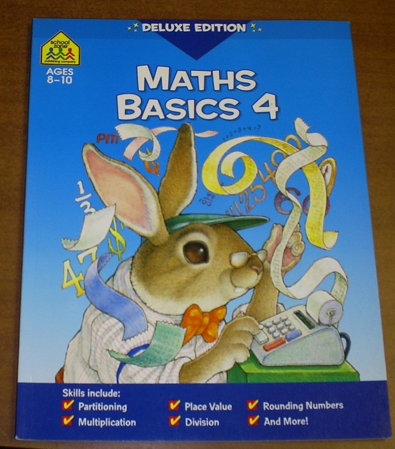 MATHS BASICS 4 DELUXE EDITION AGES 810 Amazon.in Books