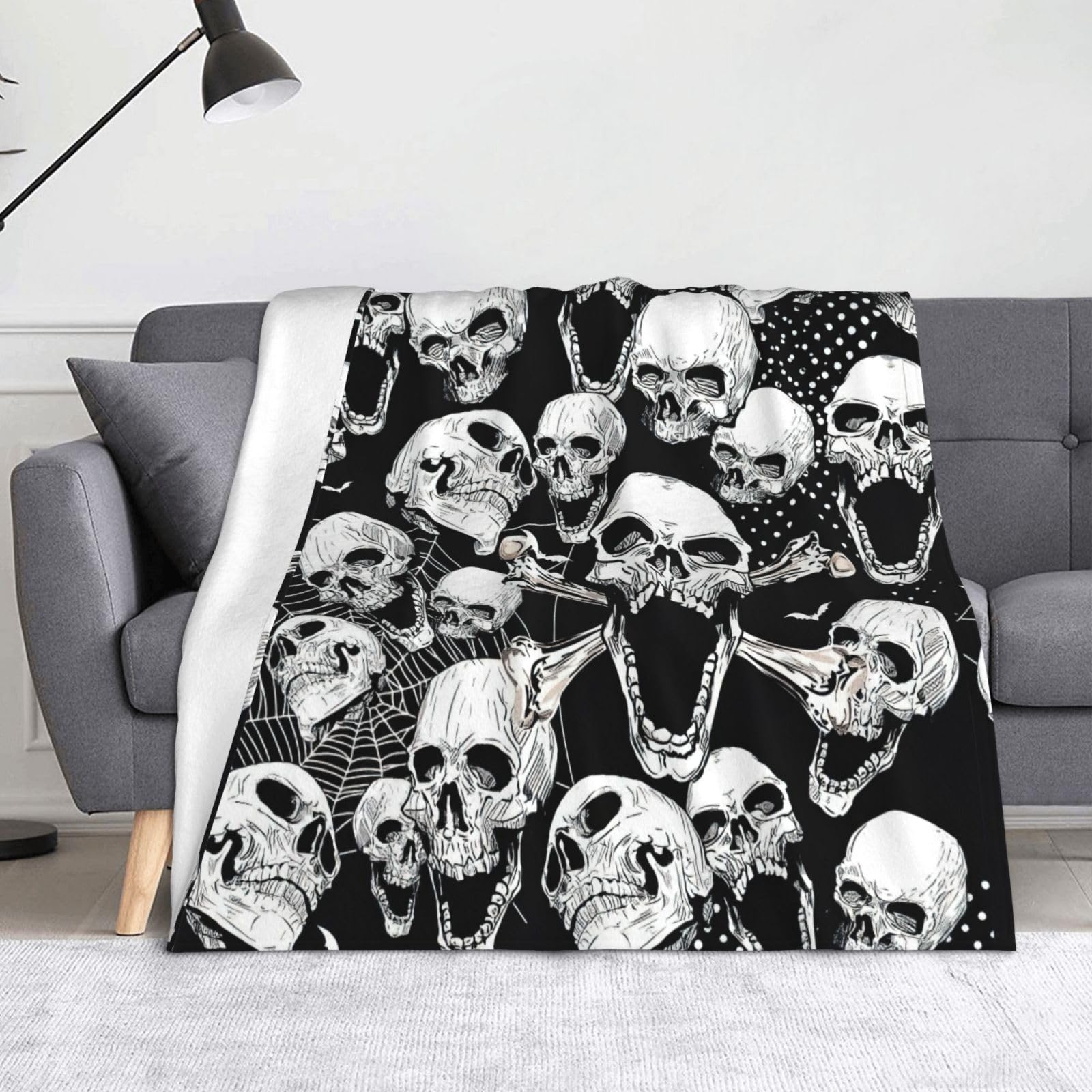 Couverture chaude en flanelle pour soirées cocooning sur le canapé salon