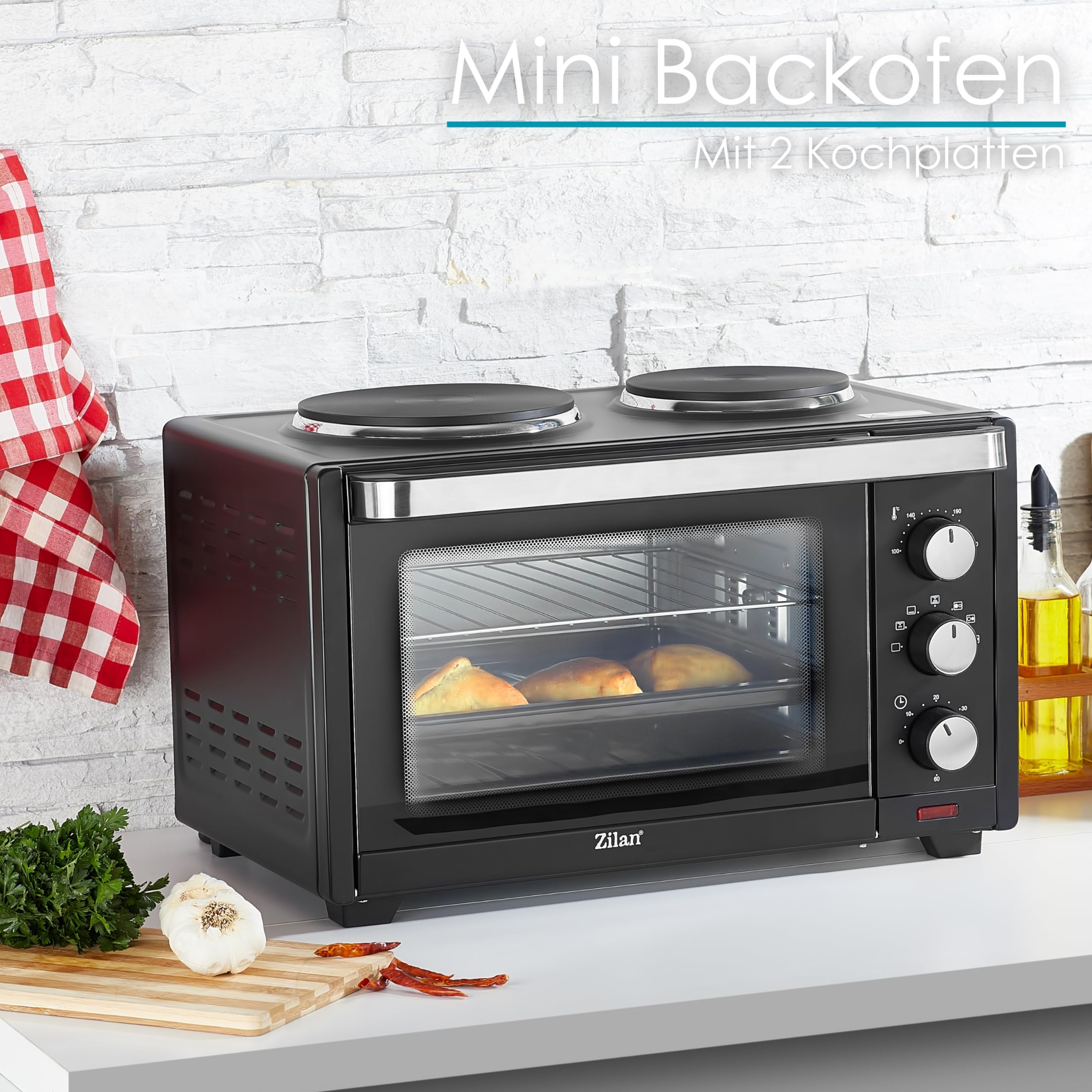Mini Backofen mit Herdplatten 28 Liter | Elektrischer Drehspieß | Integrierte Kochplatten | Pizza-Ofen | Minibackofen | Miniofen | 3in1 Backofen | Krümelblech | Ober-/Unterhitze | Energiesparend