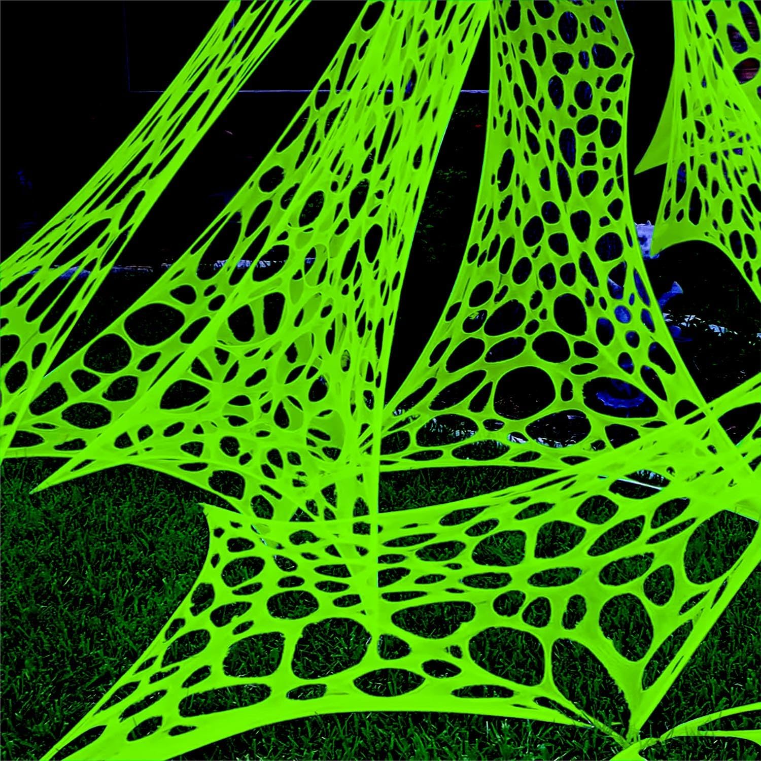 YHFUISK 700 sqft Giant Durable Spider Web for Halloween Decoration Outdoors, Glow in The Dark Stretchy Beef Netting, Green Giant Spider Web Outdoor Decoration (24FT x 4FT)