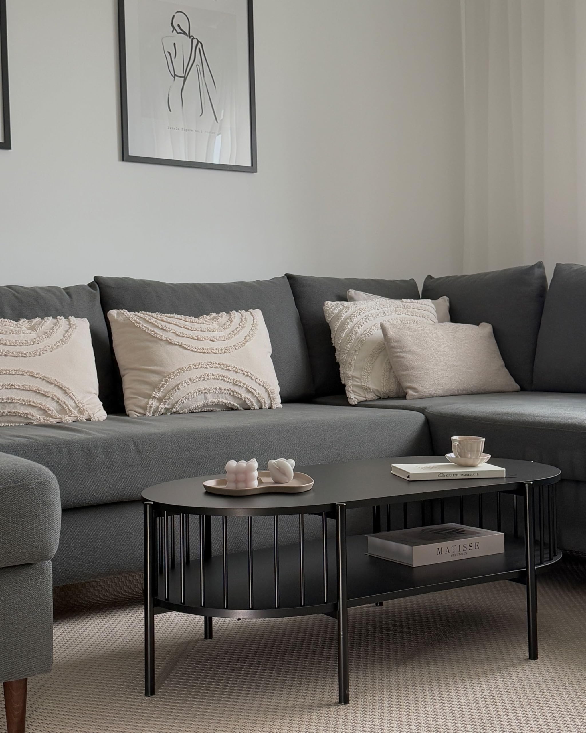 Beliani Couchtisch oval schwarz mit Metallbeinen Ablagefach offene Gitter-Optik Oreana