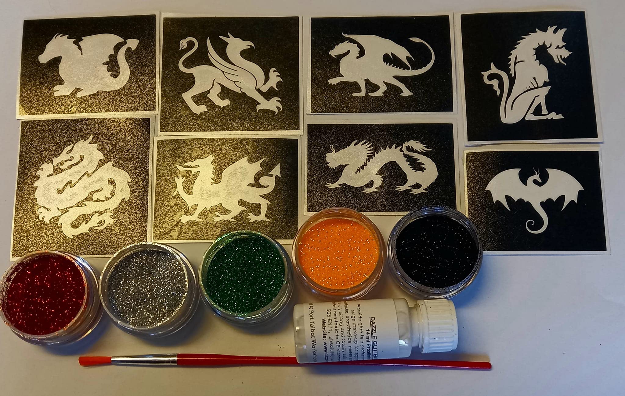 Dragon glitter tattoo set including 30 stencils + 5 glitter colors + glue