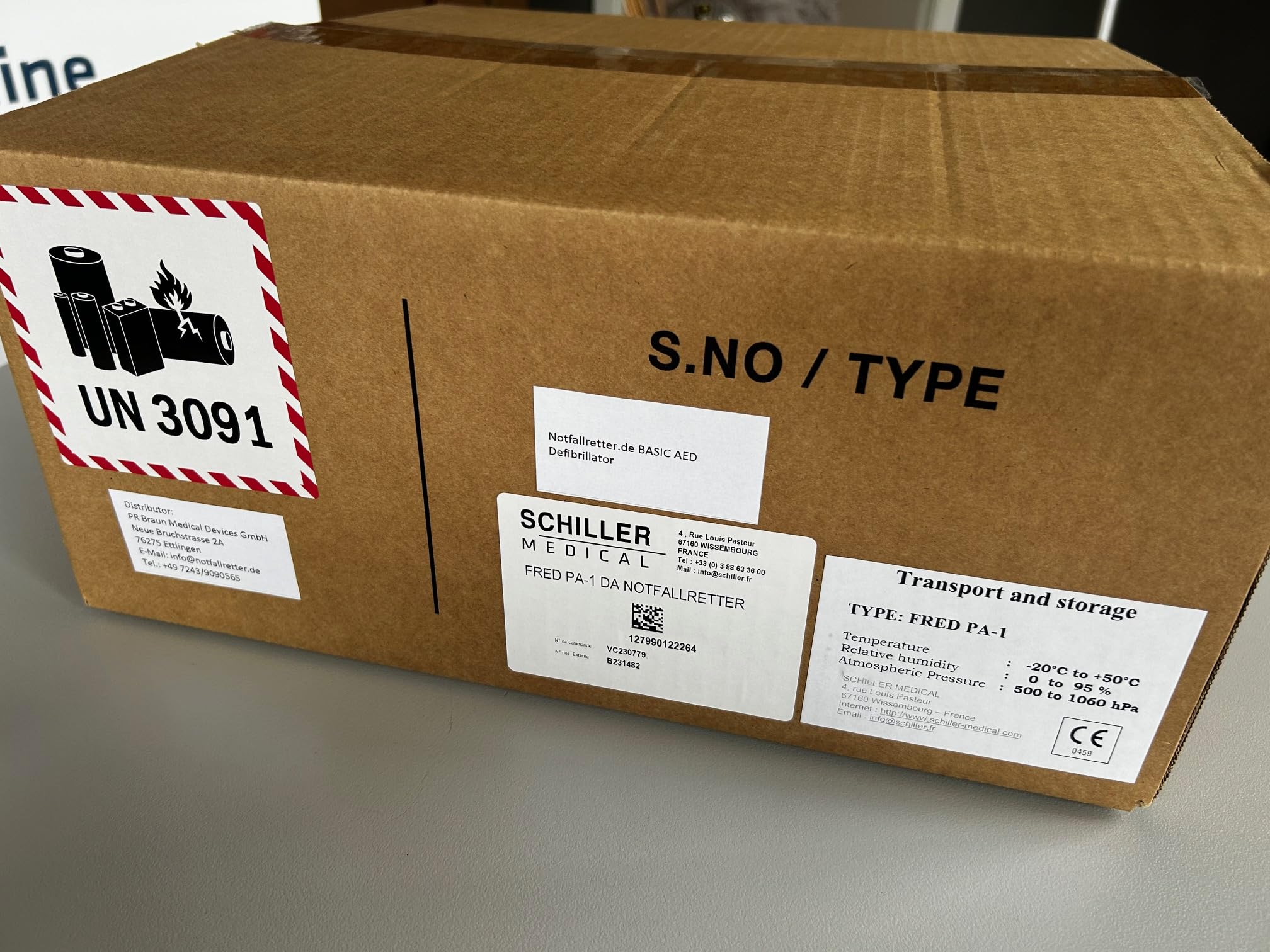 Notfallretter Defibrillator AED Basic, vollautom. Schockauslösung, Garantie Schiller Deutschland, HLW-Unterstützung inkl. Metallwandkasten & AED Standortwinkel, MDR-zertifiziert
