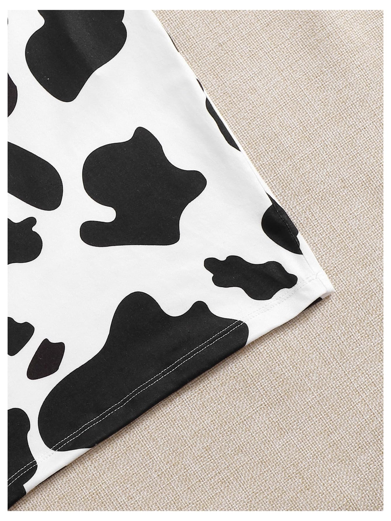 WDIRARA Women's Cow Print Bodycon Mini Cami Dress Spaghetti Strap Dresses