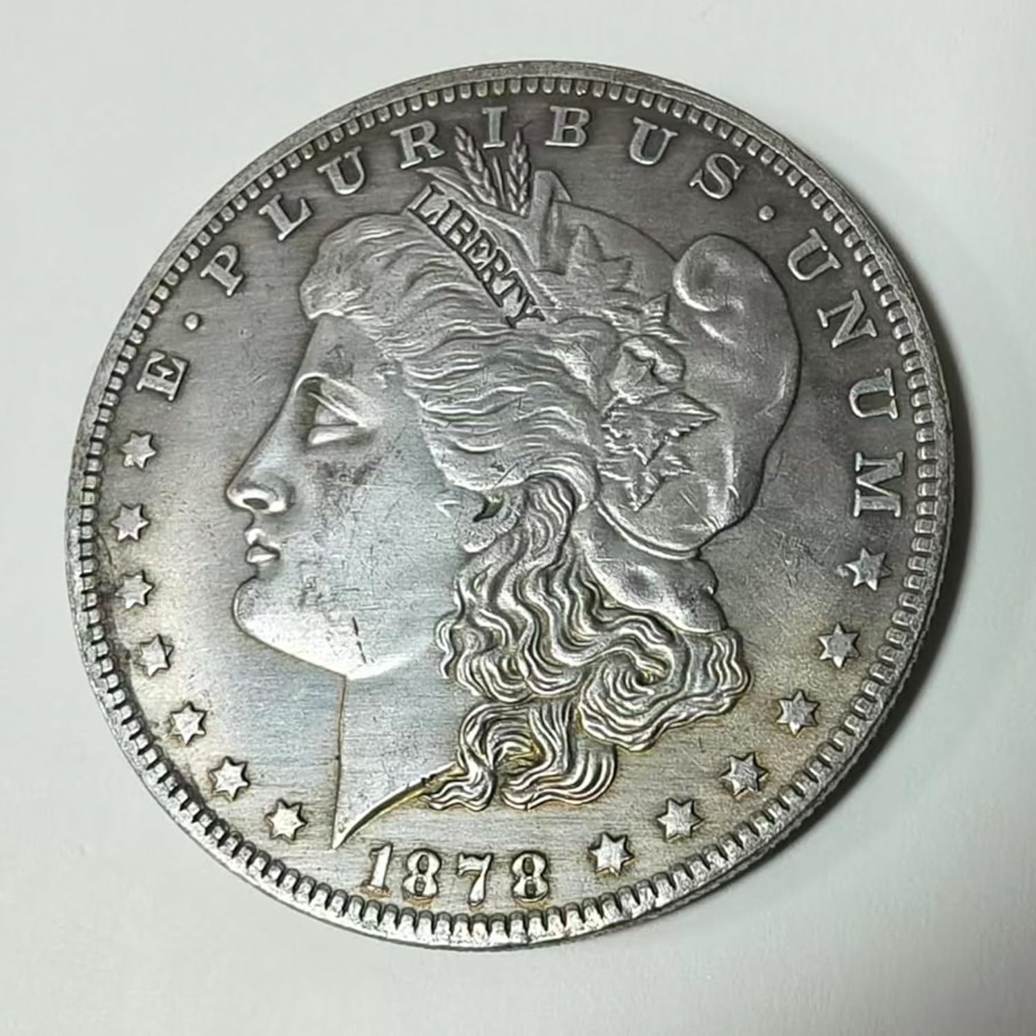 Morgan Silver Dollar Collectors Coin 1884 front view with aged patina