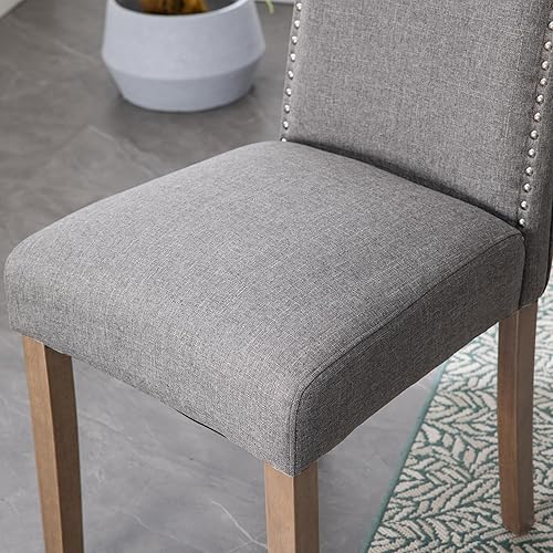 Miniatura 9 de Elegante silla de comedor tapizada Parsons con ribete plateado de cabeza de clavo y patas de madera maciza resistentes