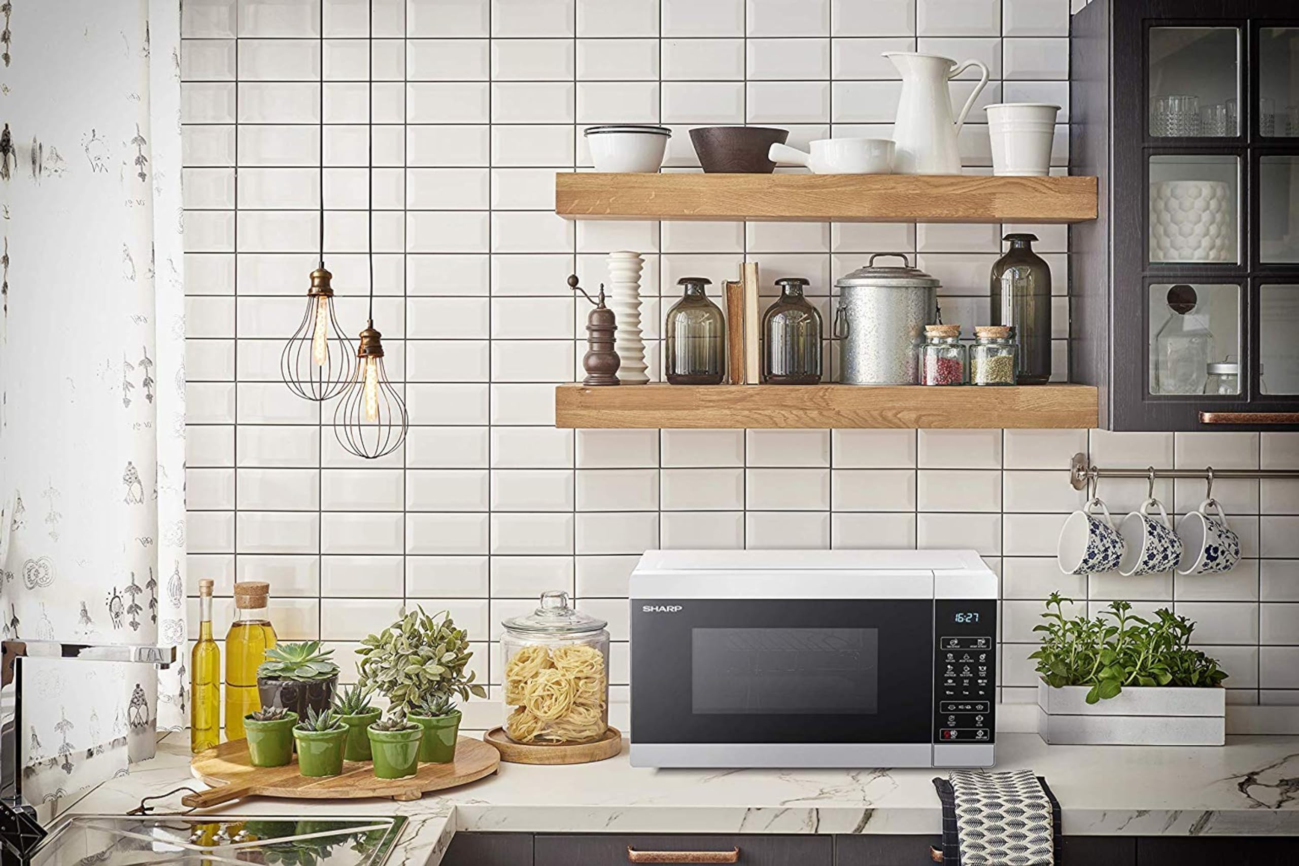 SHARP YC-MG02ES Kuchenka mikrofalowa, 20 l, z funkcją grillowania, programem rozmrażania, 11 poziomów mocy, funkcja timera, płyta obrotowa w zestawie
