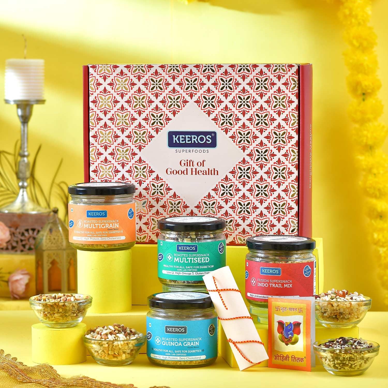 Keeros Healthy Bhai Dooj Gift Hamper for Brother with Moli Chandan Tikka Chawal Mishri | Combo of Sweet & Salted, Tasty & Nutritious Super Snacks in Glass Jars Packed in a Premium Gift Pack-image-1