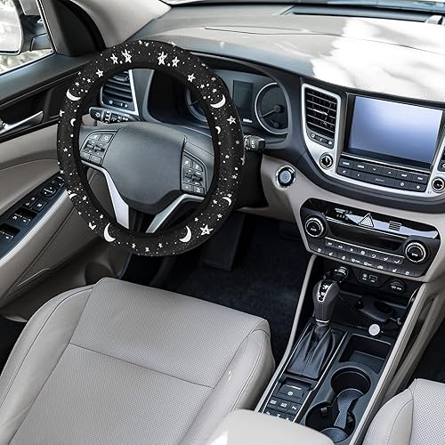 Miniatura 5 de Juego de 4 accesorios para automóvil con estampado de lunas negras y estrellas blancas, funda para volante con 2 portavasos y llavero de cuero para