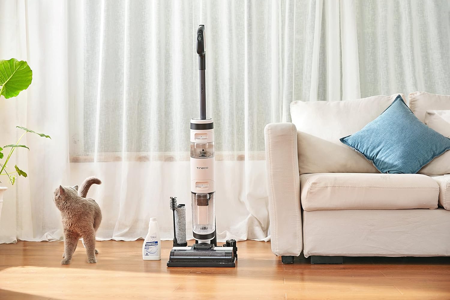 Tineco iFloor 3 Plus cleaning a kitchen floor with spilled liquid