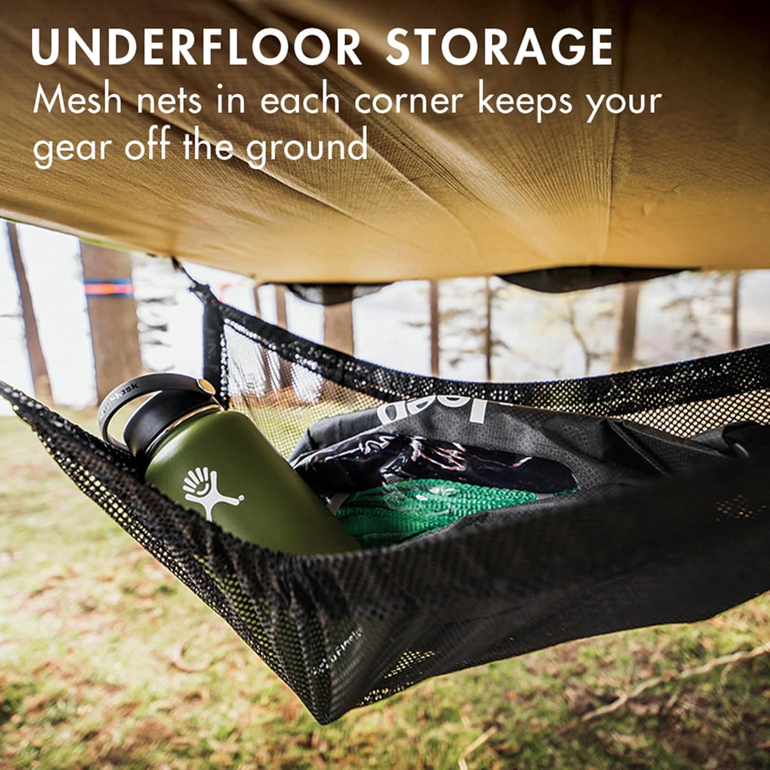 Close-up of the underfloor storage net in a Tentsile Trillium Hammock, holding a water bottle and bag