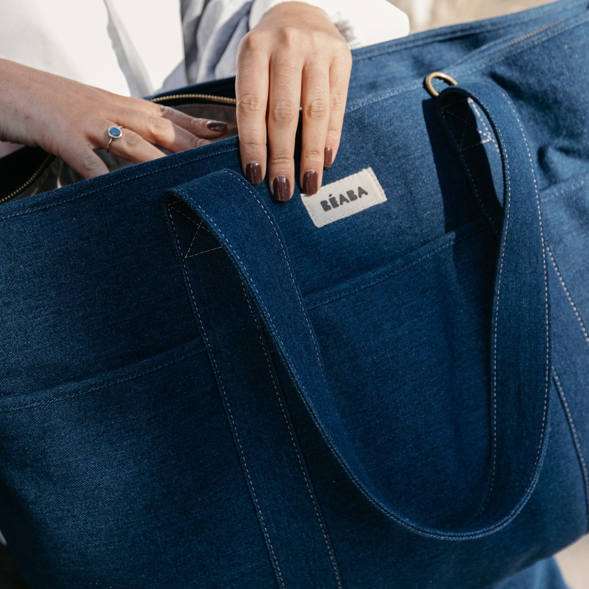 Béaba, Wickeltasche Madrid Modular 22L, großer Tote Bag, Baby-Wickeltasche für Eltern mit 11 Fächern, Isoliertasche, Kinderwagenbefestigung, Wickelunterlage, Denim