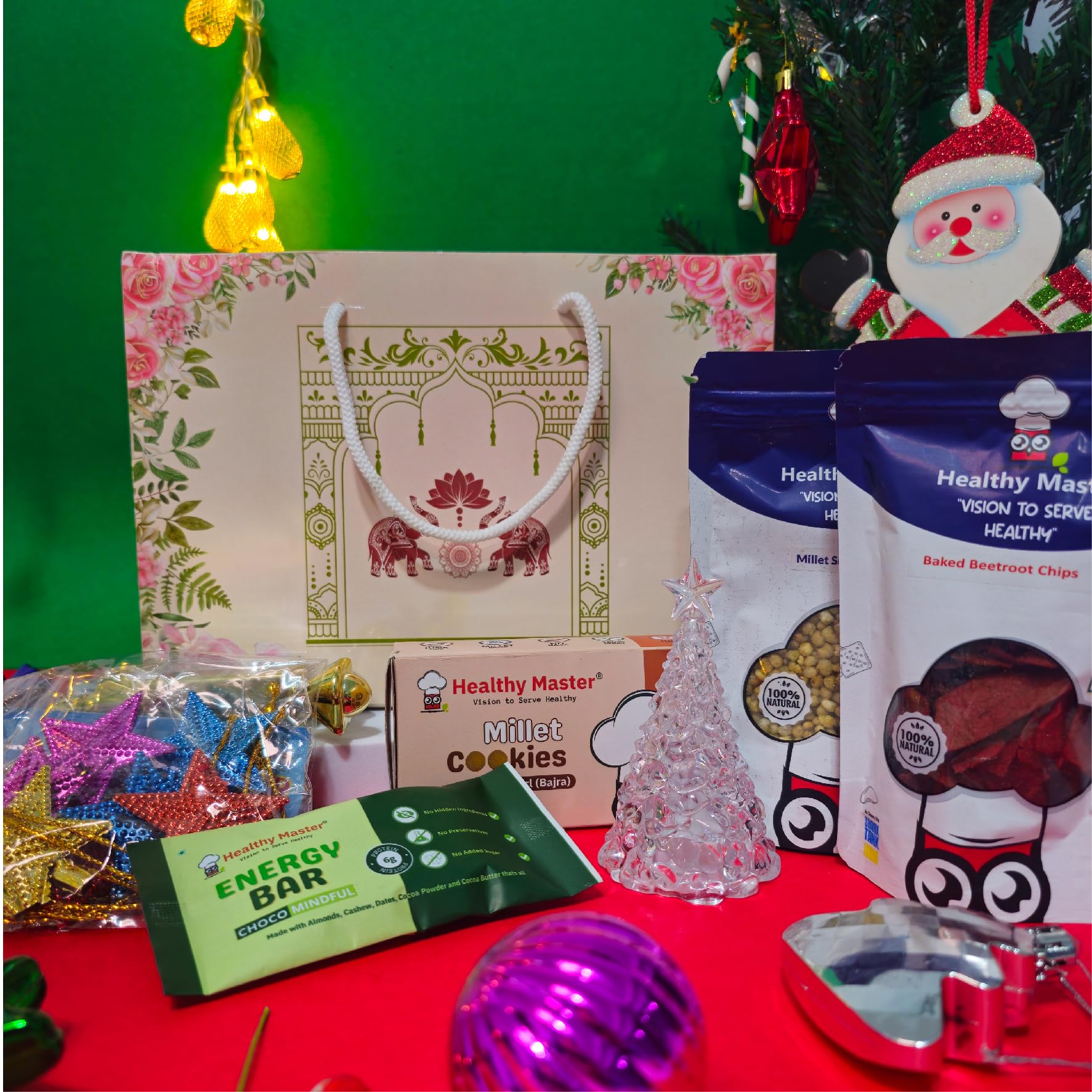 Healthy Master Jinglebell Treats Box of 6 | Premium Christmas Gift Box | Healthy Snacks | Beetroot Chips, Millet Balls, Christmas Stars, Cookies, Christmas Tree | Xmas Gift Hamper for Loved Ones | Corporate Gift Hamper | Festive Healthy Treats