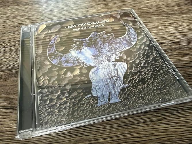 Amazon.co.jp: SYNKRONIZED: ミュージック