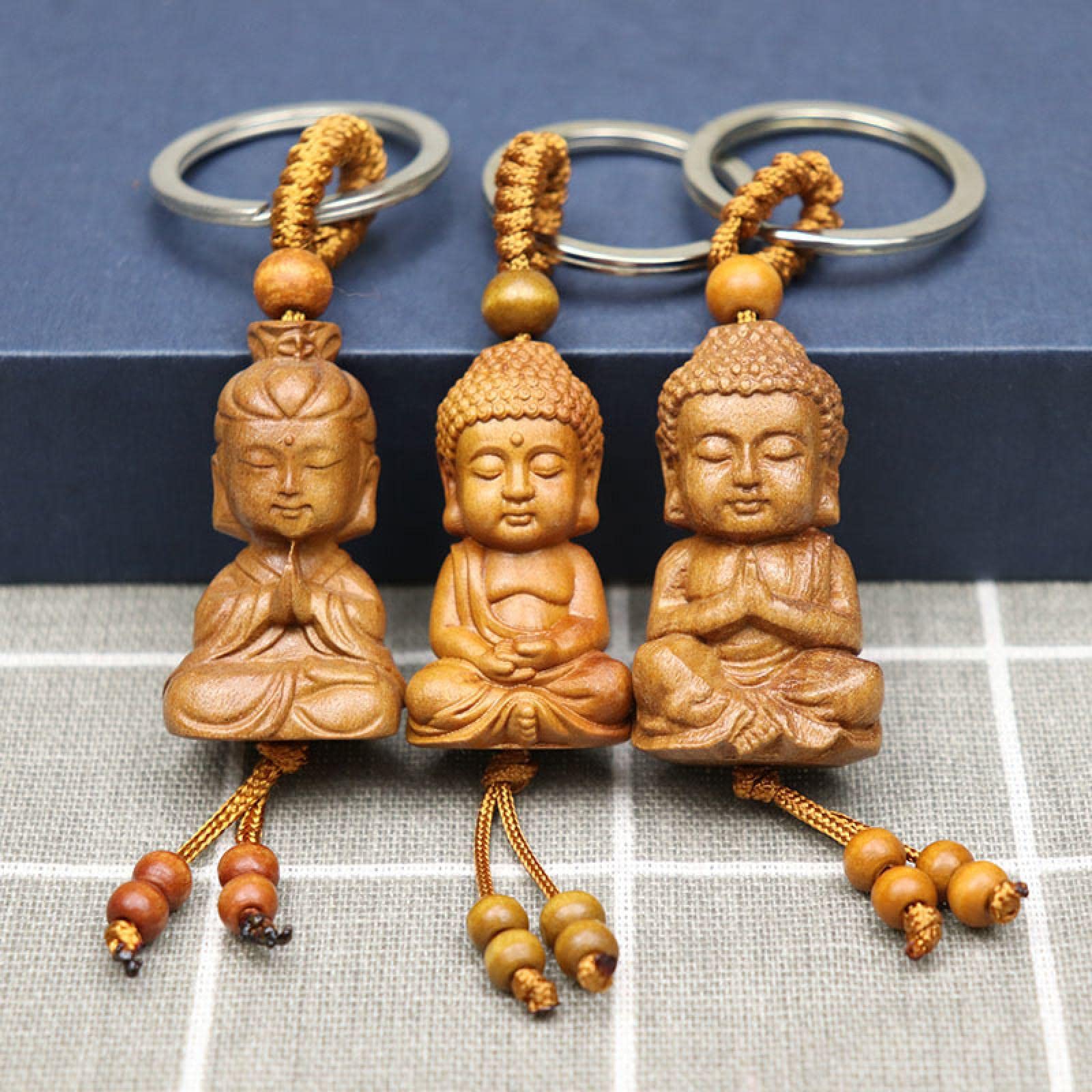 Amazon｜桃木彫り釈迦仏キーホルダー木製観音菩薩キーホルダー付工芸品 