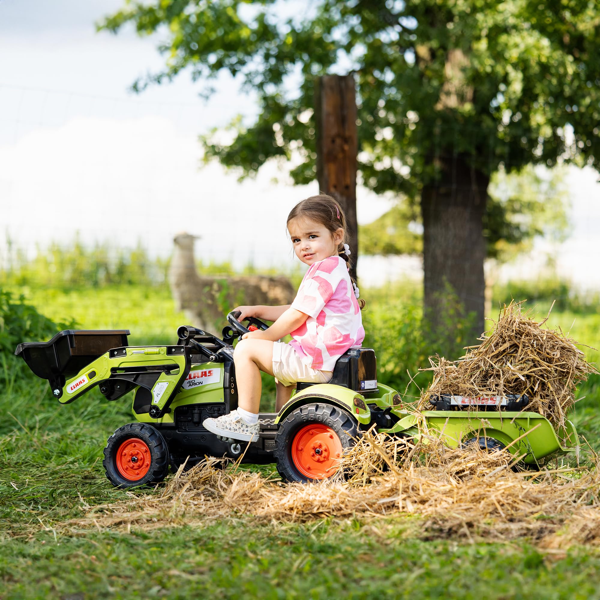 CLAAS Tractopelle Arion 410 avec remorque