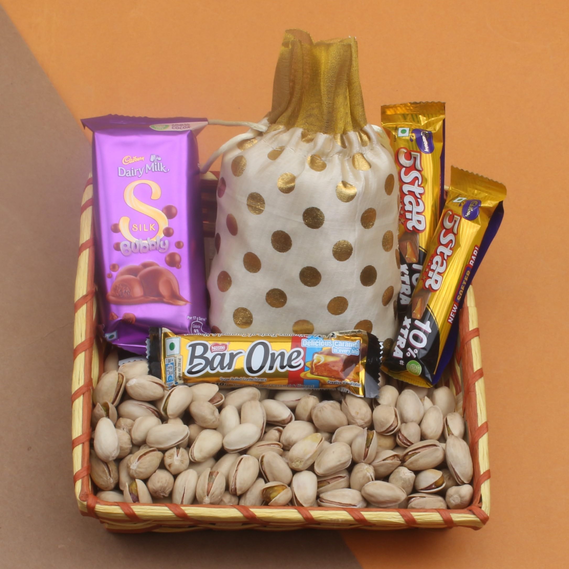 SFU E Com strengthen your bond with by sending a basket full of healthy delights including Pistachios Nut, along with Bubbles chocolates to wish them | 388