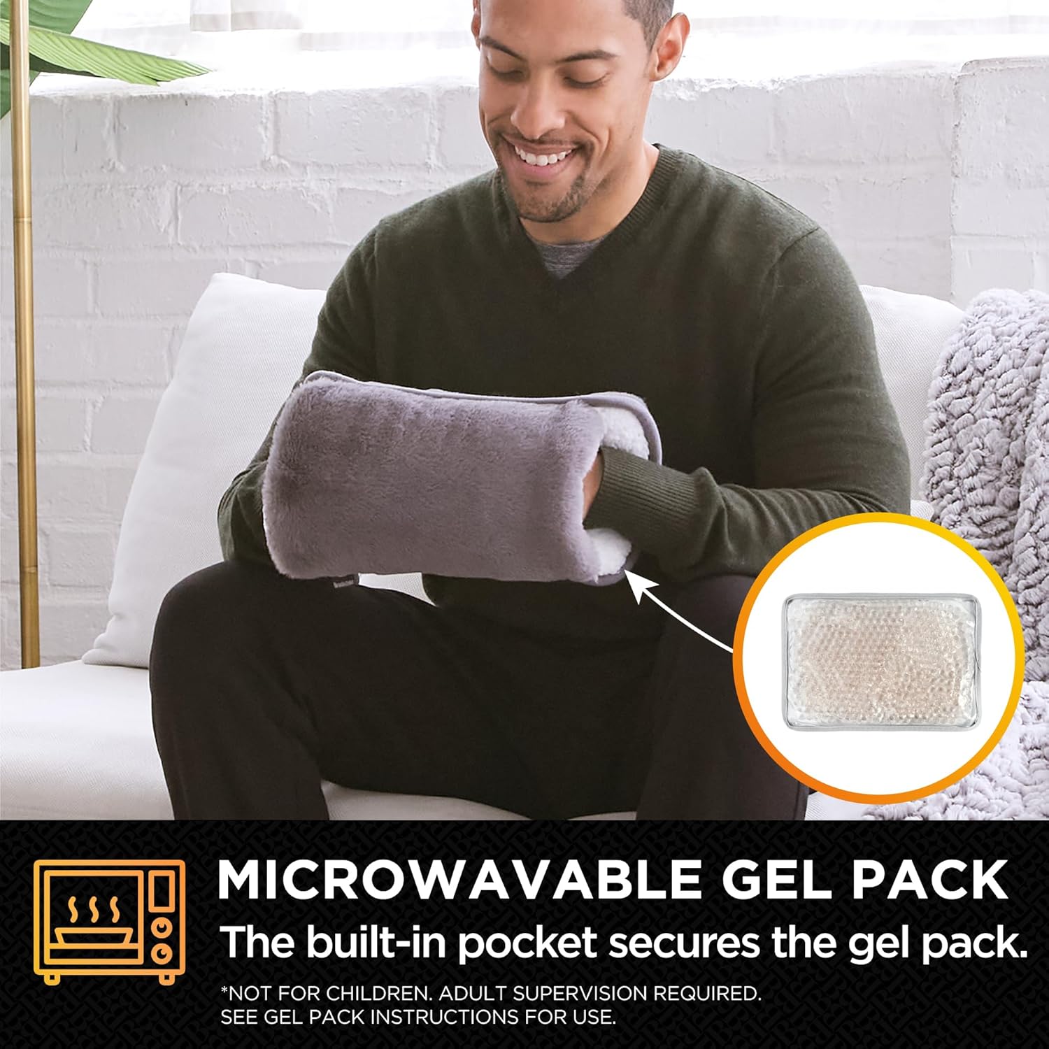 Person inserting the microwavable gel pack into the hand warmer's built-in pocket
