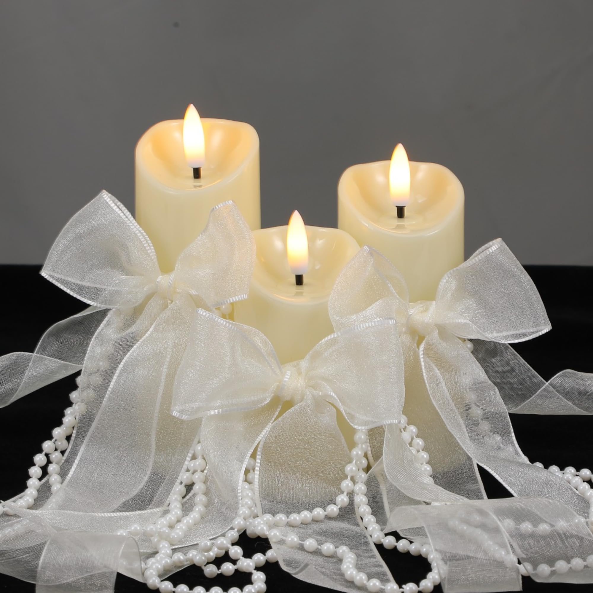Photo 1 of VIHOSE 3 Set/10 Pcs Pearl Bow Flameless Candles with Remote, Ivory LED Pillar Candle Set with Pearl Chain Organza Ribbon, Flameless Flickering Candles for Wedding Bridal Shower Church Decoration