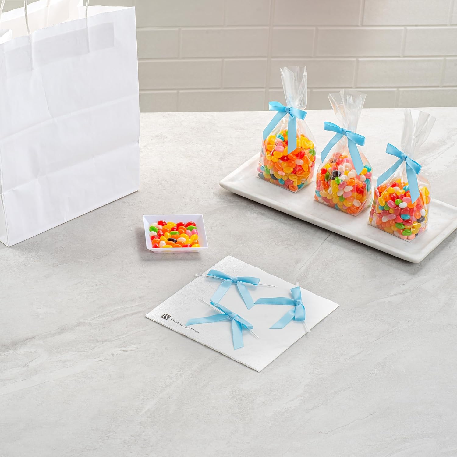 Restaurantware-Gift Tek 3 x 2.5 Inch Satin Ribbon Bows, 100 Twist Tie Bows - Pre-Tied, Vibrant, Light Blue Polyester Gift Wrapping Bow, for Treat Bags, Crafts, Packages, Decoration - Image 7