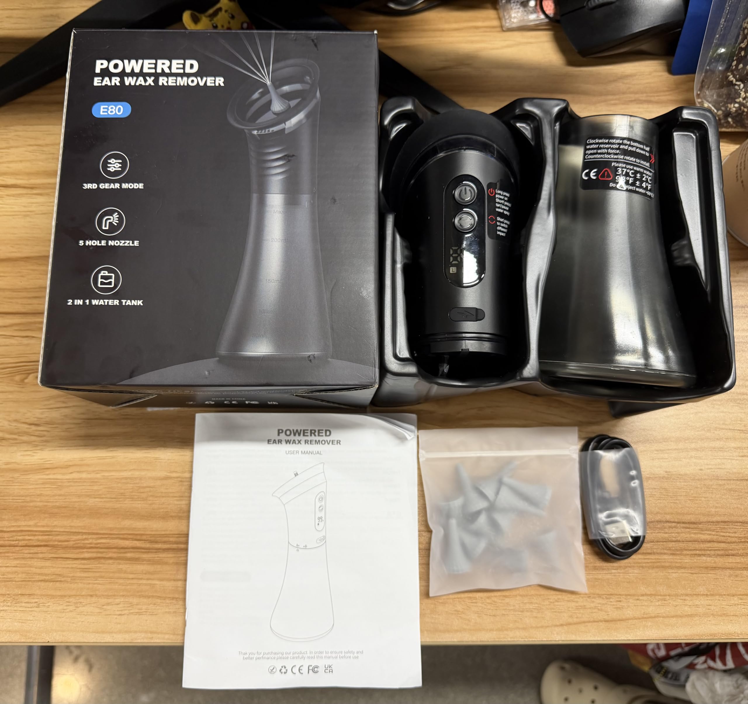 Limpiador de Oído Eléctrico, Tanque de Agua Doble Integrado, Limpiador Oidos Adultos con 12 Boquillas, 3 Modos, IP67 Resistente al Agua, USB-C Recargable, Negro