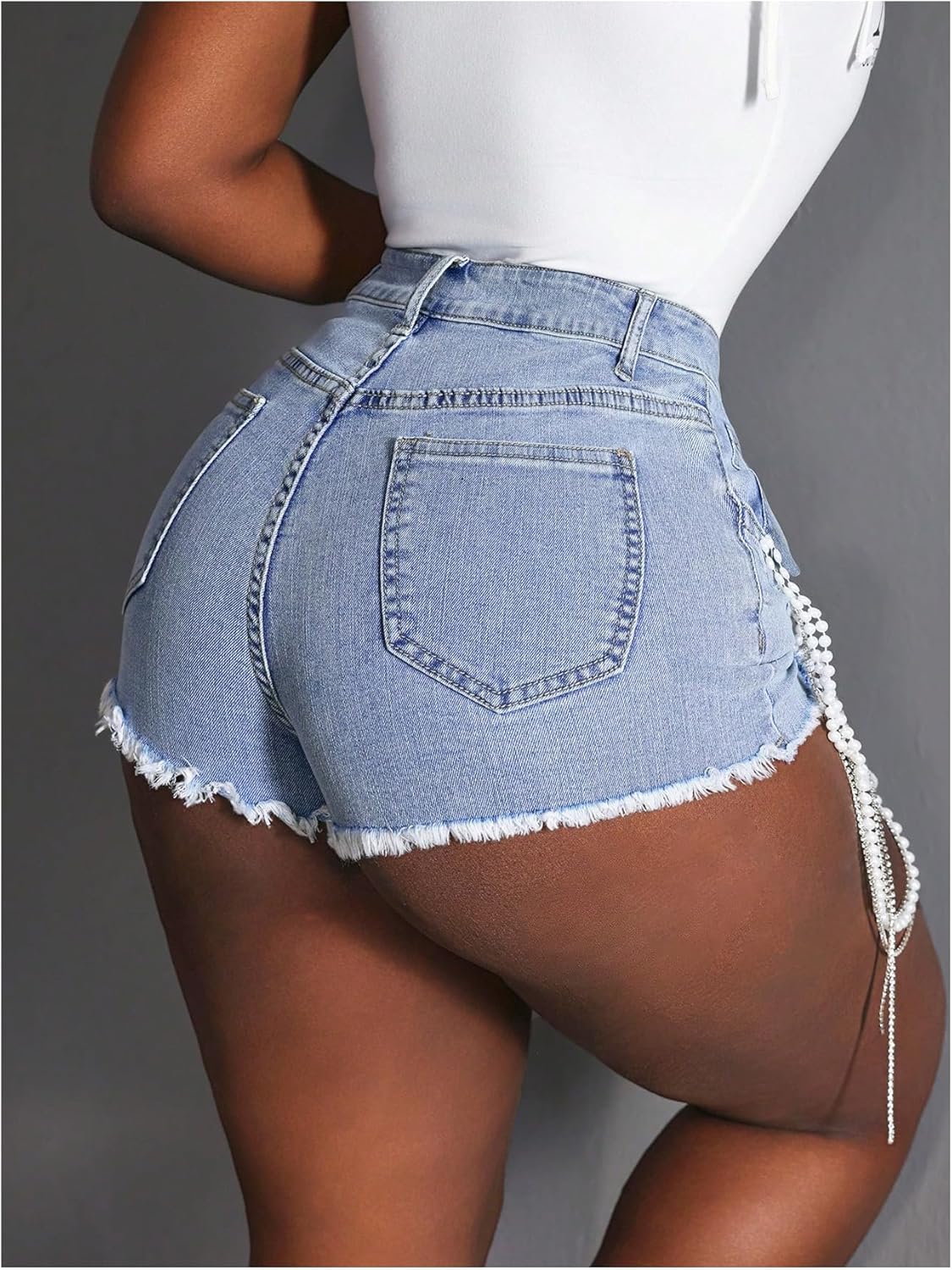 WDIRARA Women's Pearl Beaded Chain Denim Shorts Stretchy Ripped Raw Hem Jean Shorts - Image 2
