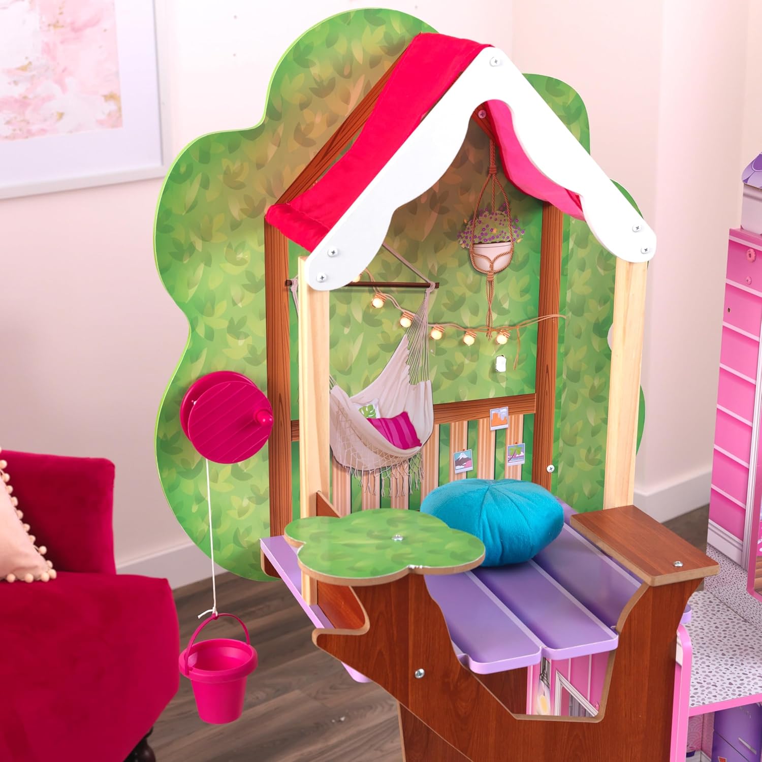 Close-up of the treehouse with fairy lights and bucket mechanism
