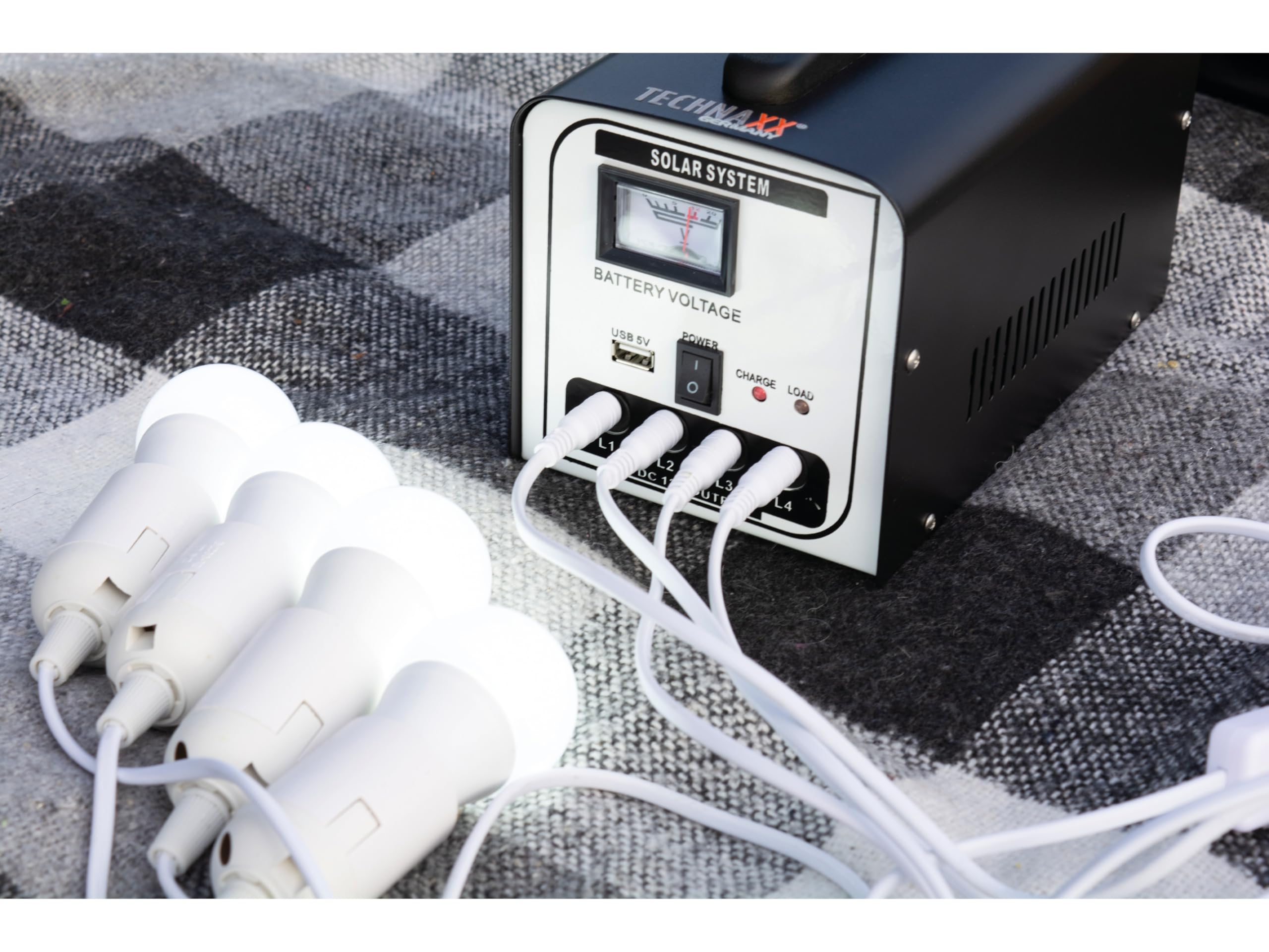 Kit de estación solar de 18W TX-200 de Technaxx con panel solar plegable de 18 W, y 4 bombillas LED - hasta 36 horas de funcionamiento, puerto USB, batería recargable SLA