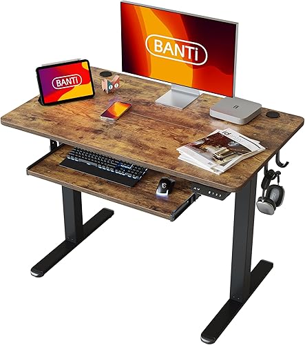 BANTI Escritorio eléctrico de pie ajustable de 40 x 24 pulgadas de altura con bandeja para teclado, escritorio de pie con tablero de empalme, marco