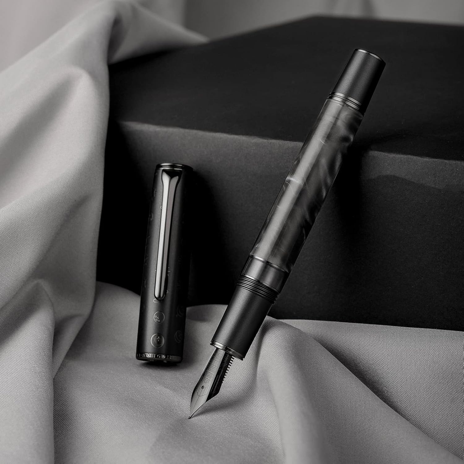 Asvine Hongdian N7 Gray Resin Piston Fountain Pen uncapped, ready for ink filling.