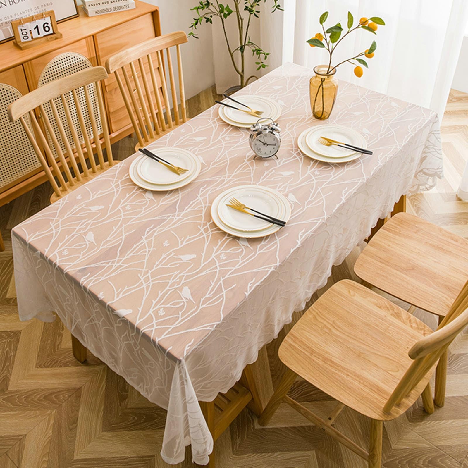 Nappe rectangulaire 140x220 cm et nappe ronde blanche en polyester anti-tache