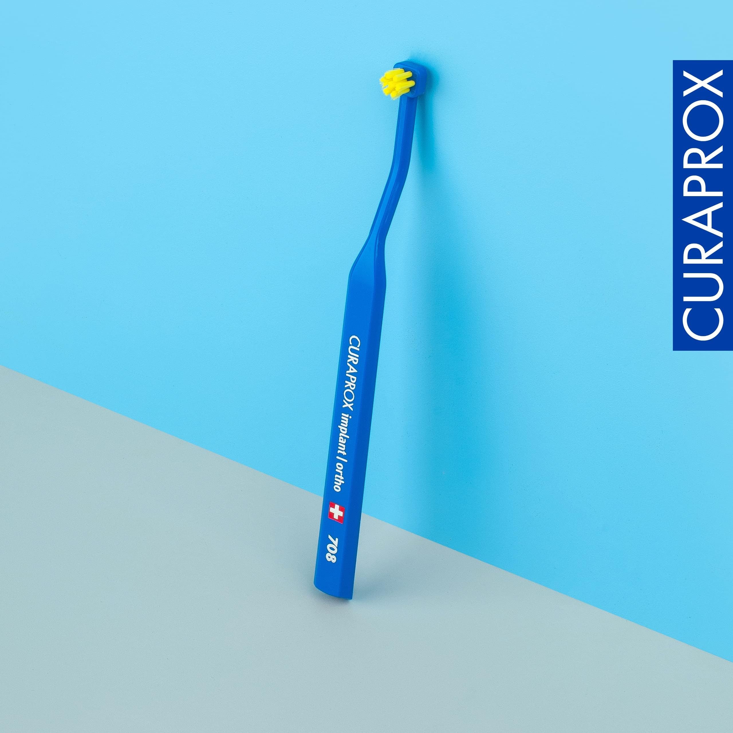Curaprox implant toothbrush-do implantów, aparatów ortodontycznych i trudnych miejsc/Elastyczna głowica do precyzyjnego czyszczenia/Niebiesko-żółty/pojedyncze opakowanie/Made in Switzerland