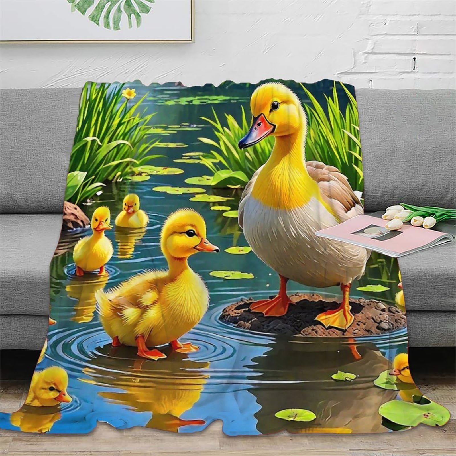 Plaid canard jaune 3D doux pour soirées cocooning sur le canapé du salon