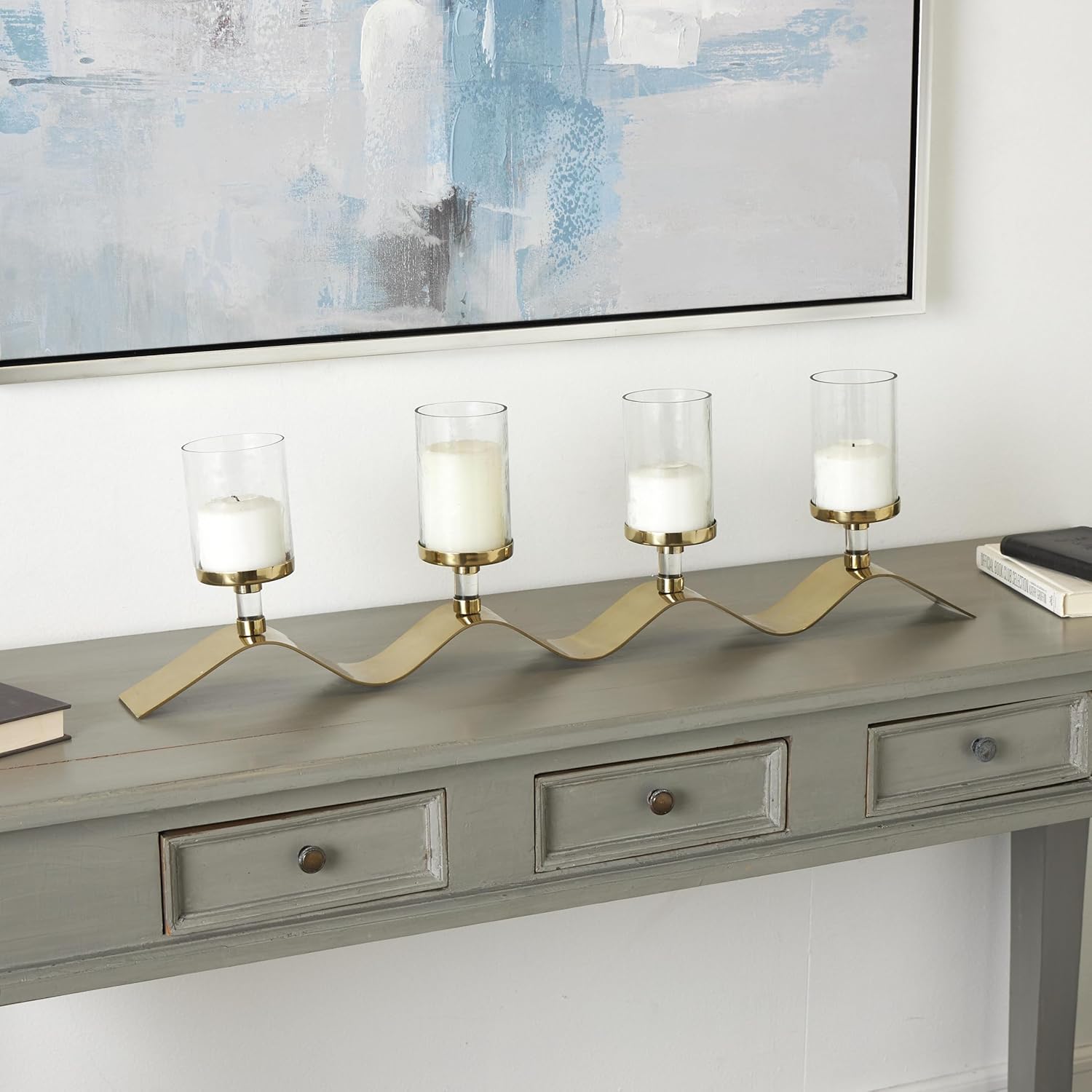 Deco 79 Stainless Steel Metal Room Hurricane Lamp 4 Candle Hurricane Candle Holder with Wavy Base, Table Centerpiece Lamp 33" x 4" x 10", Gold