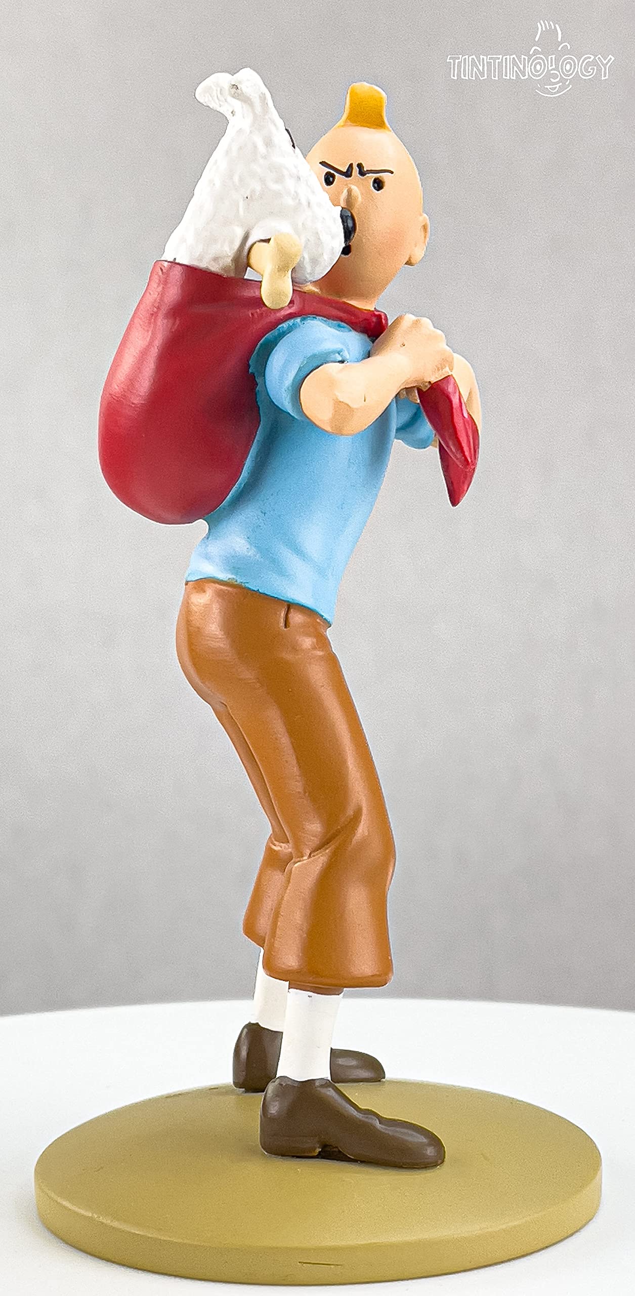 Moulinsart Figurine en résine Tintin Portant à Milu (42194)