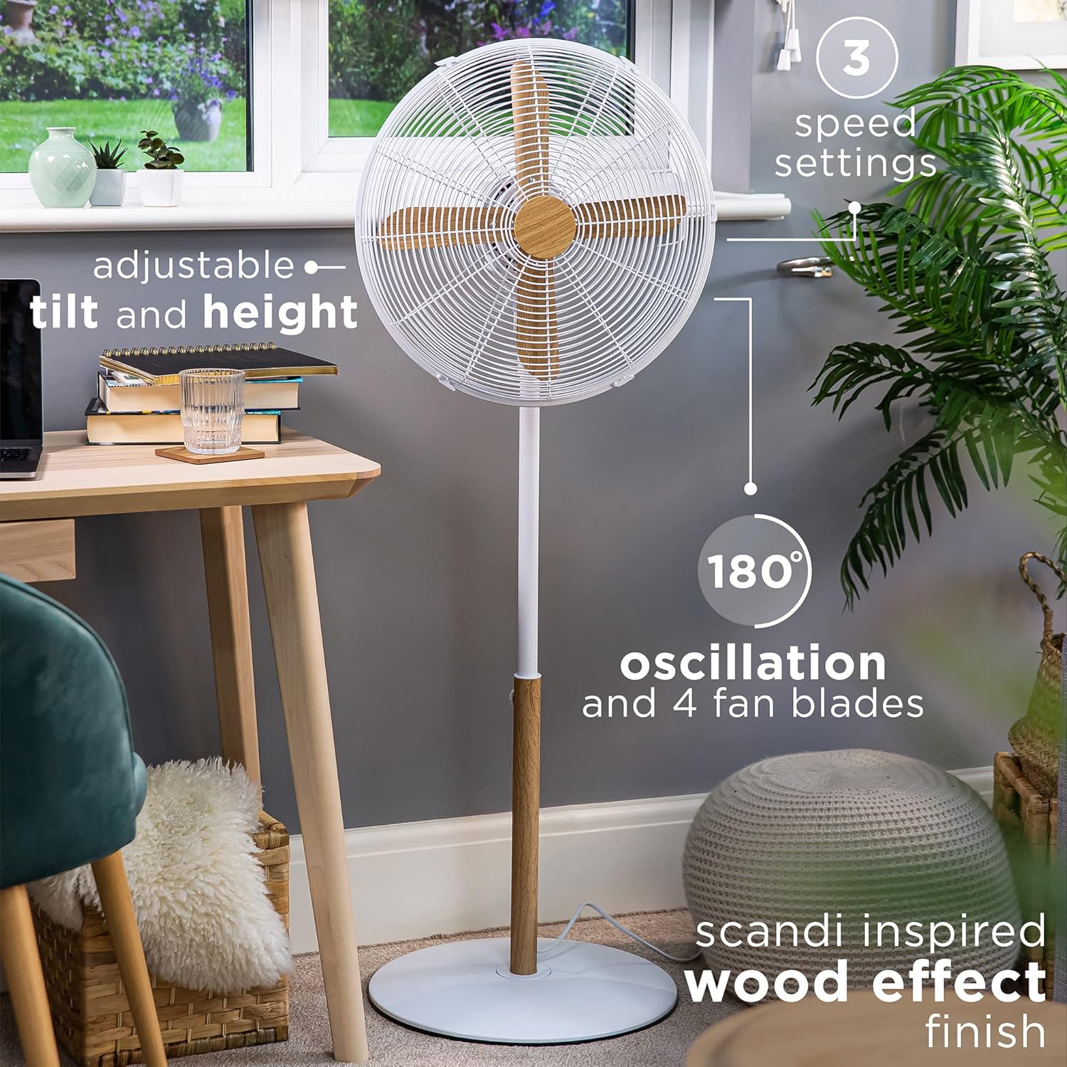 Lifestyle image of the fan in a room, with callouts indicating 3 speed settings, adjustable tilt and height, 180-degree oscillation, 4 fan blades, and Scandi-inspired wood effect finish.