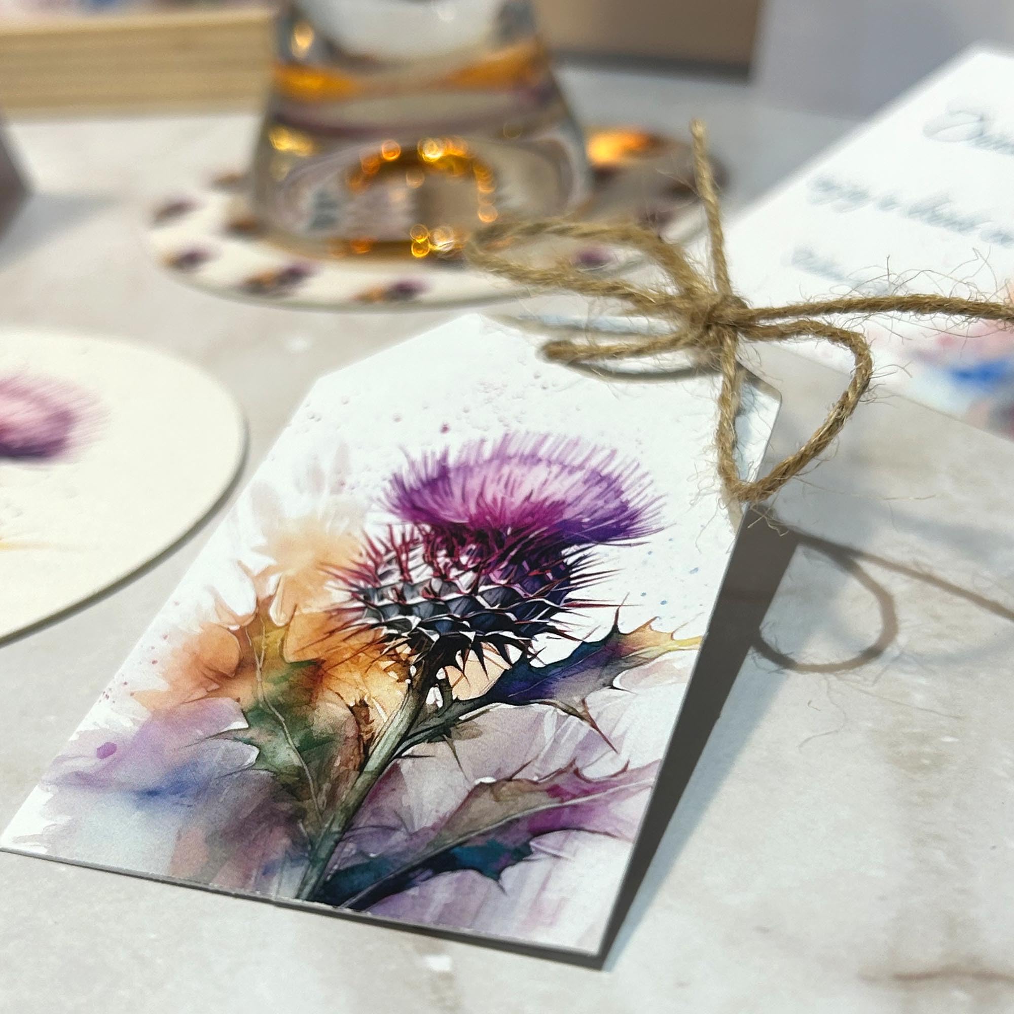 Scottish Thistle Wedding Favour Tags â€“ Crafted from Deluxe 350gsm Card, 55x85mm Medium White Gift Tags with Brown String for Wine Bottles, Scottish Burns Night Table Decorations (Pack of 20) — image 1