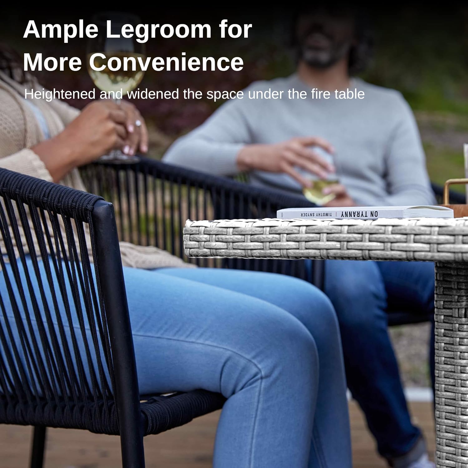 Close-up of the fire pit table showing ample legroom for comfortable seating.