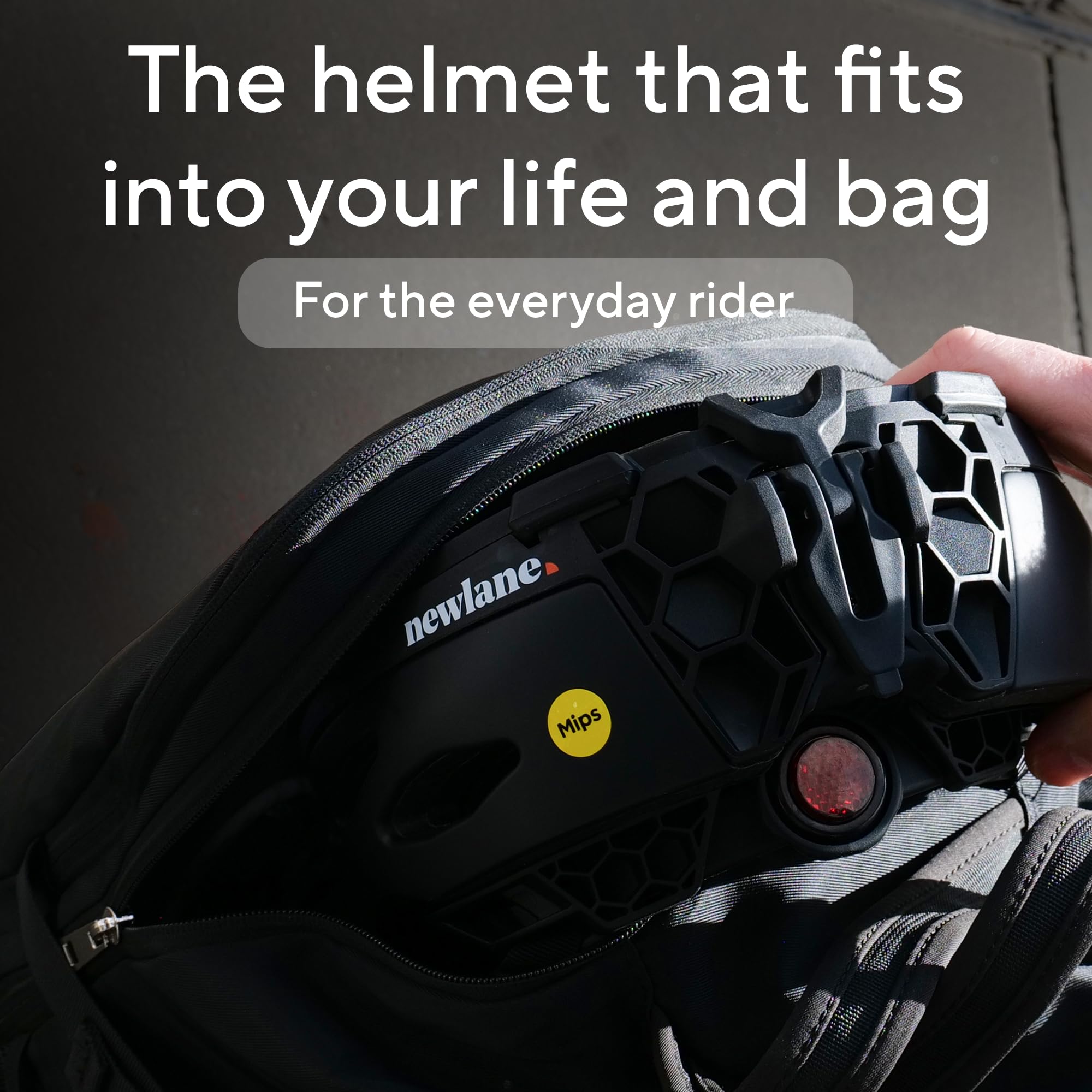 Newlane Casco da bici pieghevole con protezione MIPS (nero con linguetta bianca/M) | Compatto, leggero e certificato di sicurezza | regolabile e traspirante | Casco da bici per uomo e donna