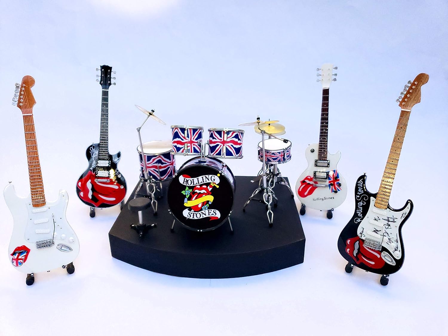 Complete set ROLLING STONES miniature drum set. Mick Jagger