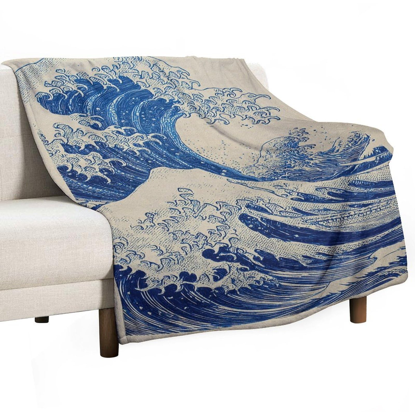 Couverture anti-boulochage vagues océan pour vos soirées cocooning canapé