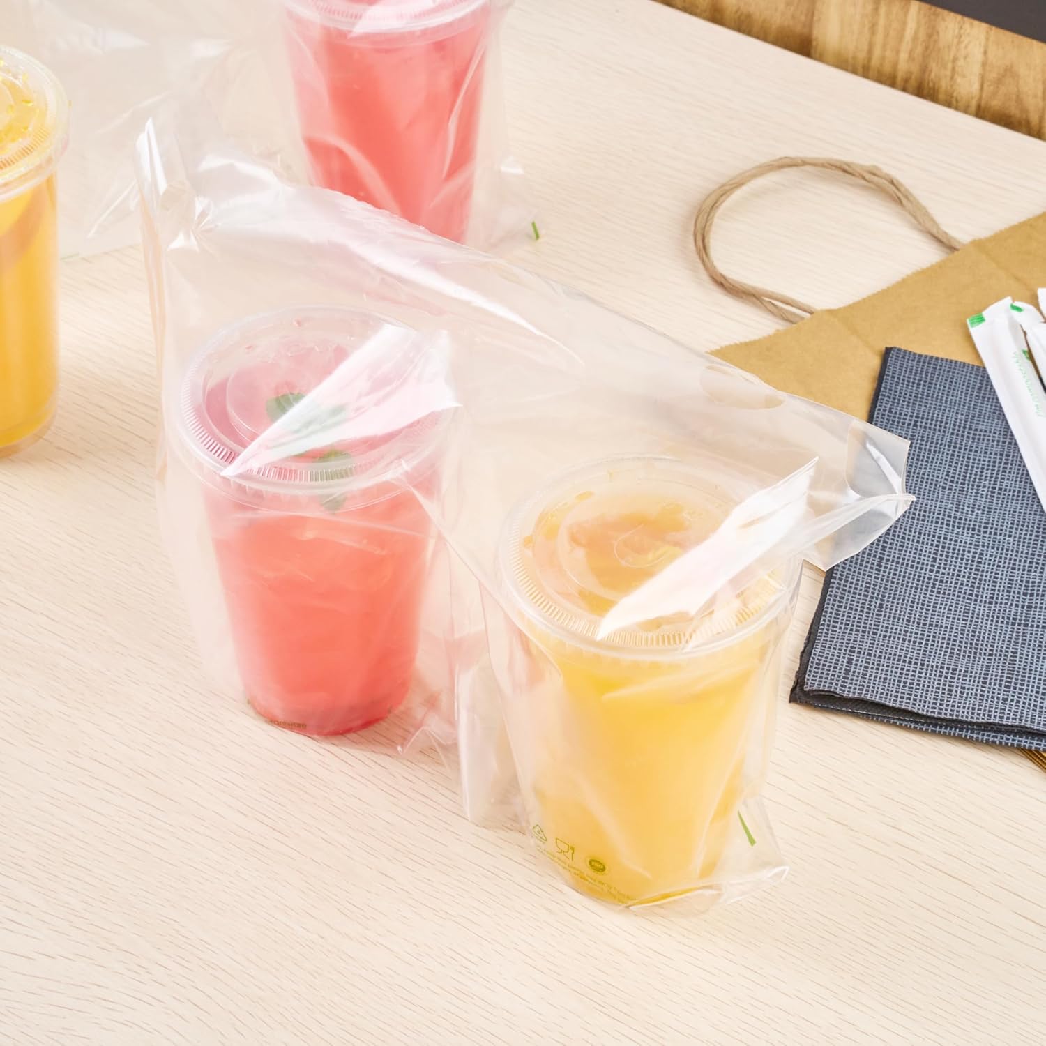 Restaurantware Basic Nature Plastic Drink Carriers 100 Double Cup Plastic Bags For Cups - Disposable With Handles Clear Plastic Drink Delivery Bags For Delivery Coffee Tea Juice
