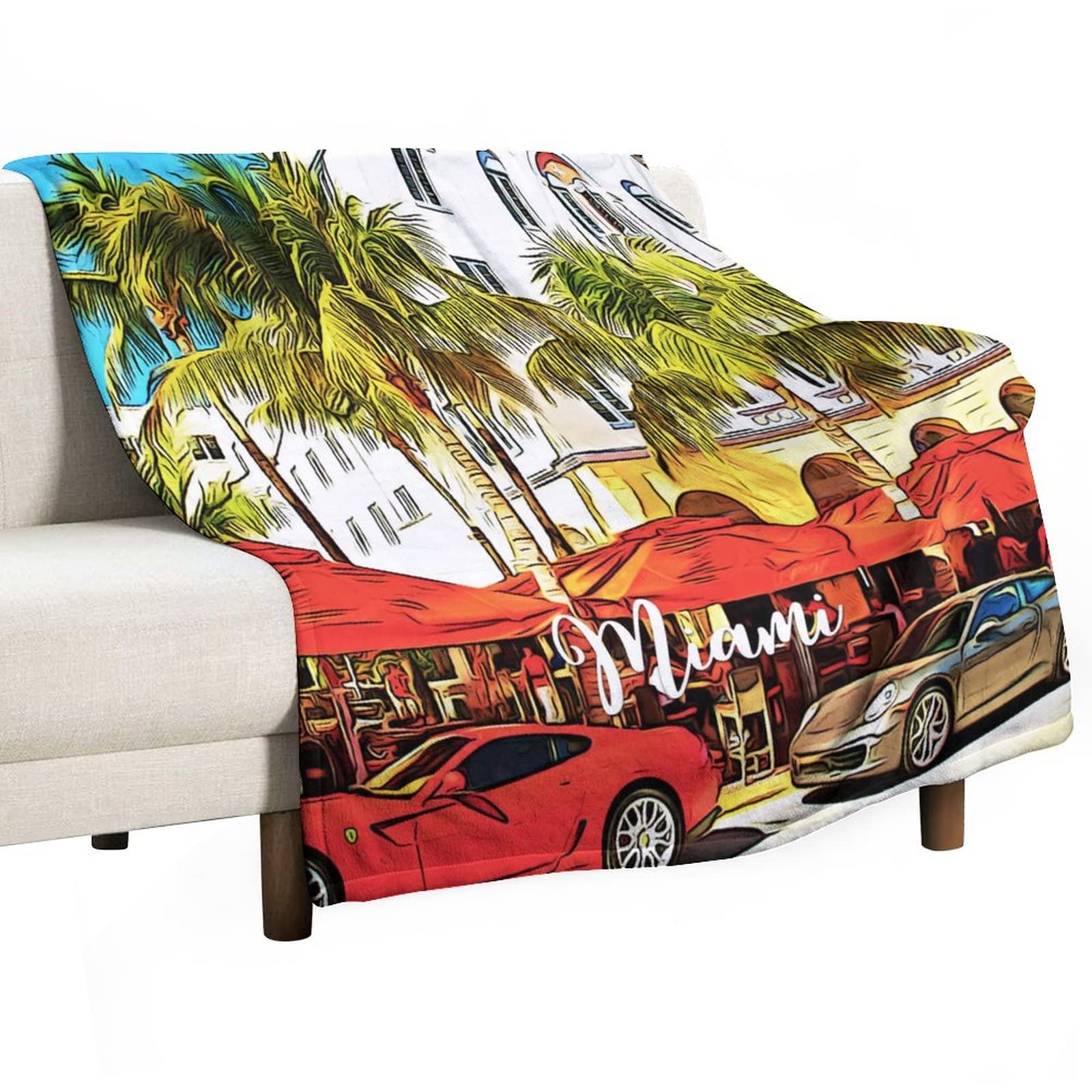 Couverture flanelle chaude Miami contre le froid sur lit et canapé