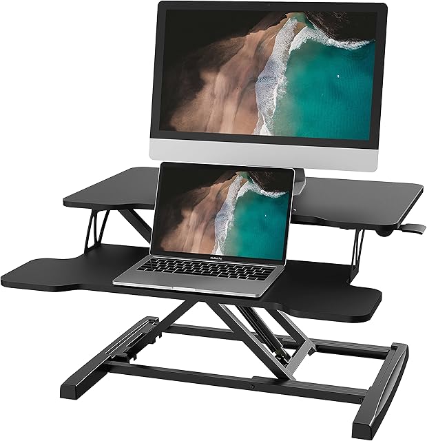 FITUEYES Standing Desk Converter 64cm Height Adjustable Sit Stand Desk with Keyboard Tray and Phone Holder for Laptop Computer Monitor, Black