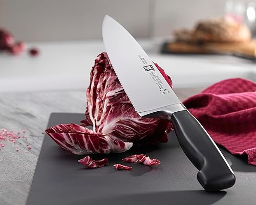 Miniatura 4 de ZWILLING - Cuchillo de chef alemán afilado de cuatro estrellas de 8 pulgadas, fabricado en una fábrica alemana propiedad de la empresa con acero de