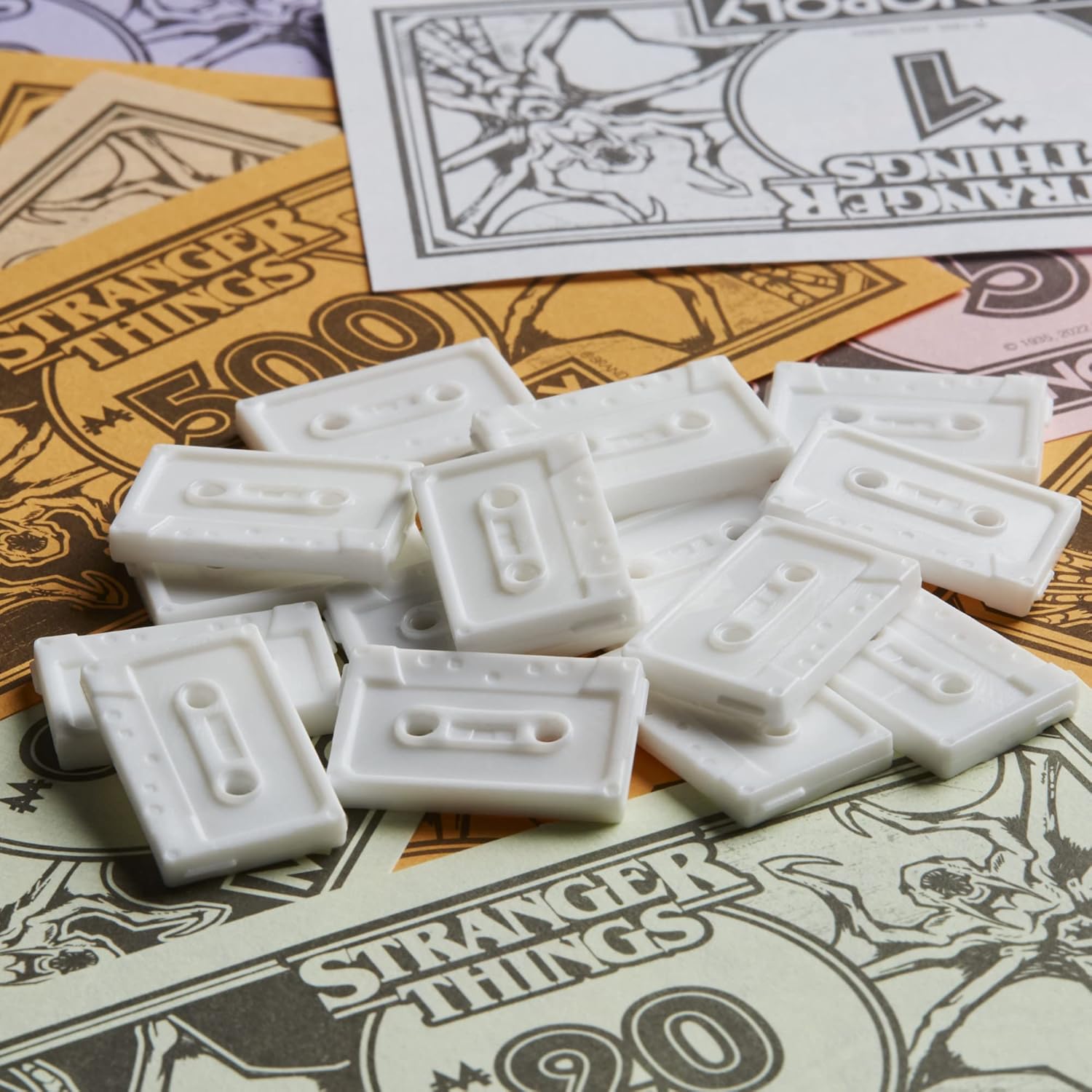 Monopoly Stranger Things Edition money and cassette tapes