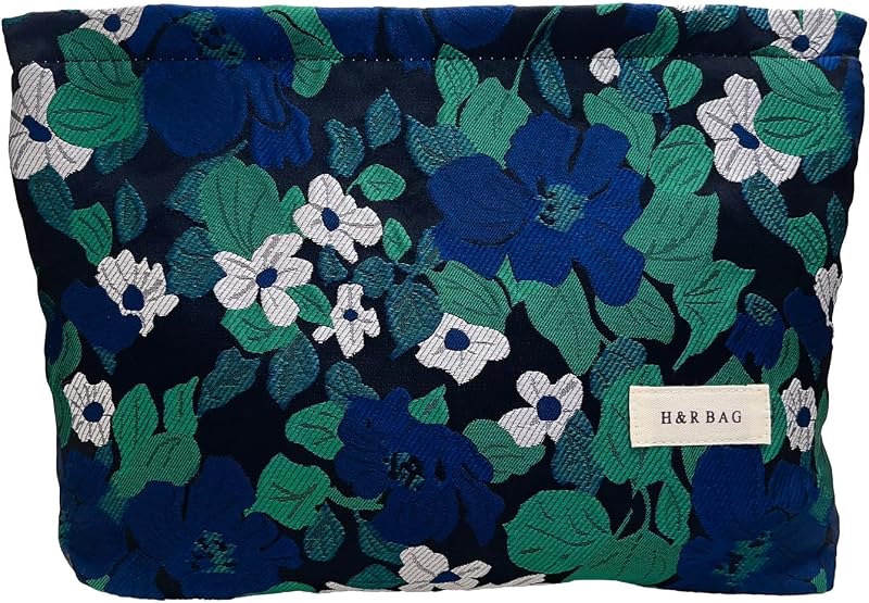 Necessaire Mussepera azul com estampa floral, zíper e forro de lona