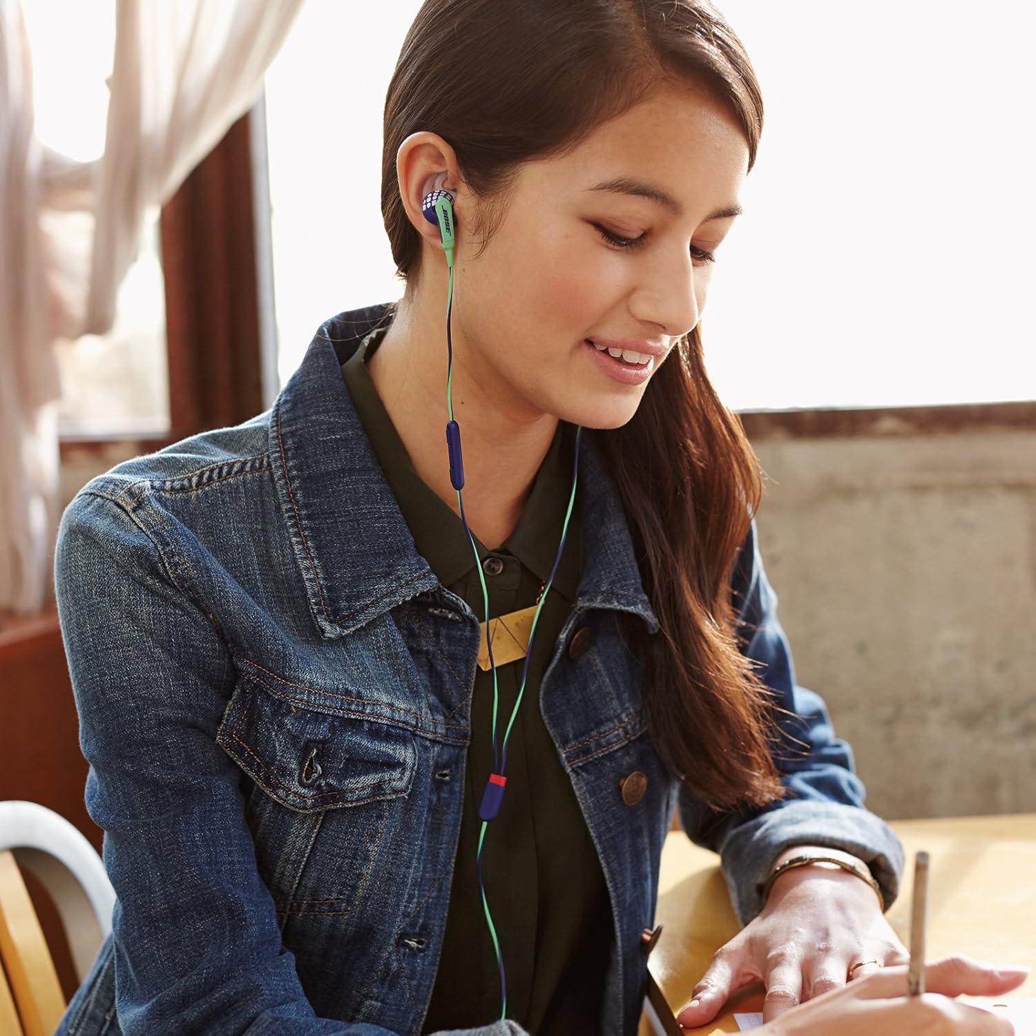 Person wearing Bose Freestyle Earbuds comfortably