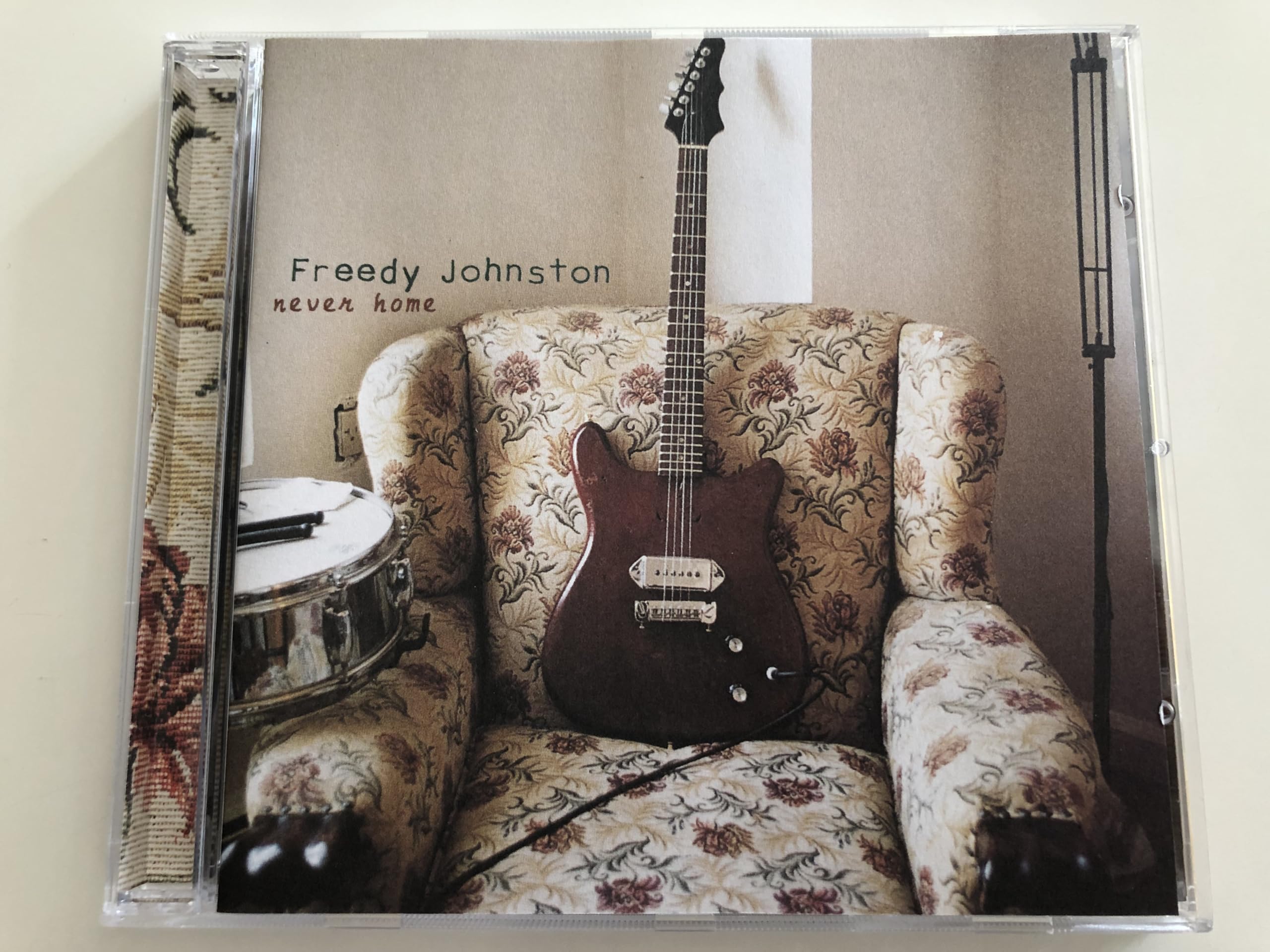 never home [Audio CD] Freedy Johnston